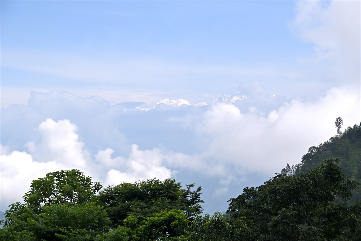 Mount Kanchenjunga Crest and Floating Mountain Mist