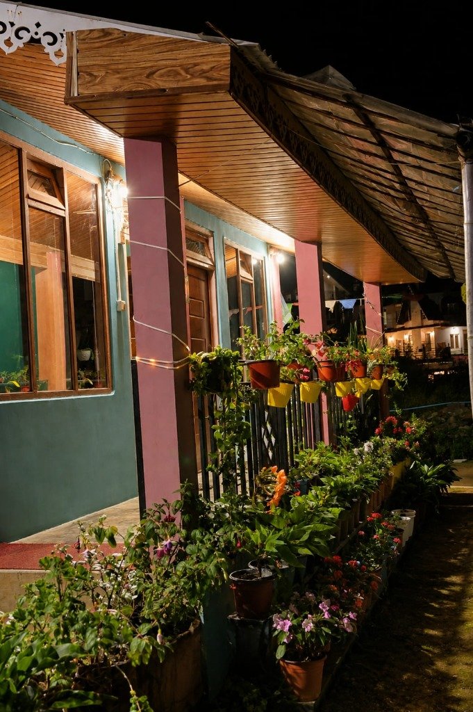 Charkole Homestay – Flower Decked Veranda & Evening Ambiance